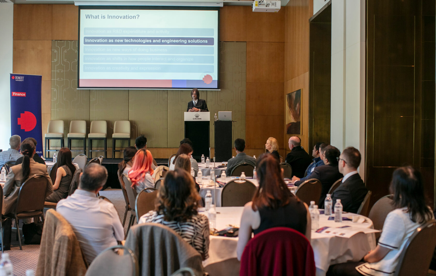 Wide view of the Melbourne Forum during a presentation